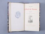an open book with a drawing of a man on it