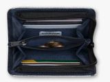 leather wallet with credit cards and coins in it on a white background