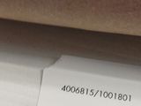 a roll of paper that has a sticker on it