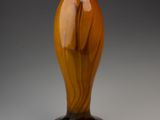 a glass vase that is sitting on a table