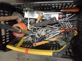 a basket full of tools and tools in it