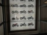 a picture of a picture of motorcycles on display in a window