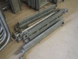 several pieces of metal are laying on the floor in a room