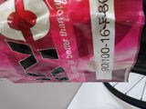 a bag of food sitting on a bicycle tire