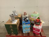 many boxes of shoes on a pallet in a room