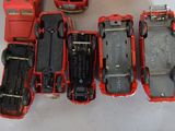 a lot of toy cars that are sitting on a table