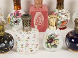 a lot of small vases that are sitting on a table