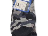 chaussettes pour homme avec un motif camouflage sur fond blanc
