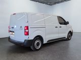 a picture of a white van parked in a garage