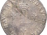 an old coin with a crown on it on a white background