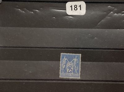a picture of a black suitcase with a blue stamp on it