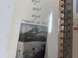 a picture of a hotel book open on a bed
