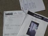 several papers on a table with a picture of a cat on it