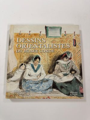 an image of a book with a picture of two women sitting on a bed