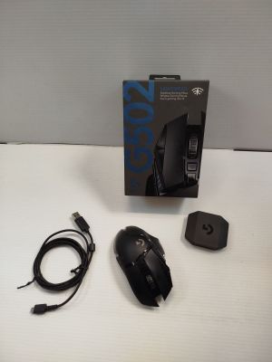a box with a mouse and other items on the table