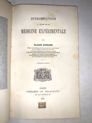 an open book with a picture of a man on it