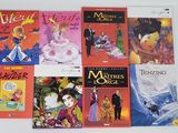 plusieurs livres pour enfants sont alignés sur une surface blanche