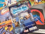 many comic books on the table and one of them is for sale