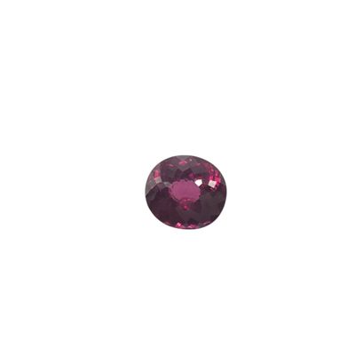 a round faceted pink tourmaline gems on a white background