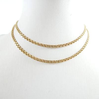 a close up of a mannequin necklace on a mannequin mannequin mannequin mannequin mannequin mannequin mannequin