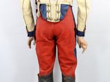 a doll of a man dressed in a military uniform