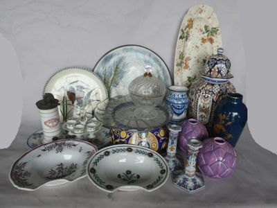 many different types of vases and bowls on the table