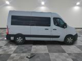 a picture of a white van parked in a garage