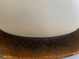 an image of a large white dome shaped object on top of a wooden plate