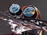 two gauges on the handlebars of a motorcycle