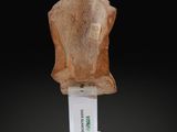 an image of a wooden sculpture of a man ' s head on a pedestal