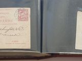 an open book that has a lot of papers on it