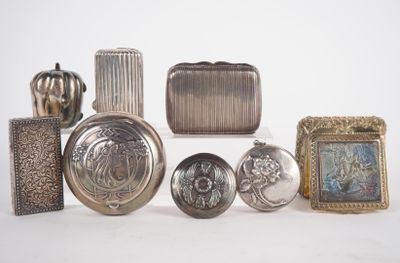 a lot of silver items sitting on a white surface