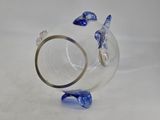 a glass vase that has a fish inside of it