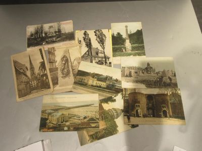 many old photographs of different buildings and buildings on display