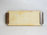 an image of a piece of wood with a piece of paper sticking out of it