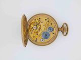 an antique pocket watch with a gold case and a blue dial