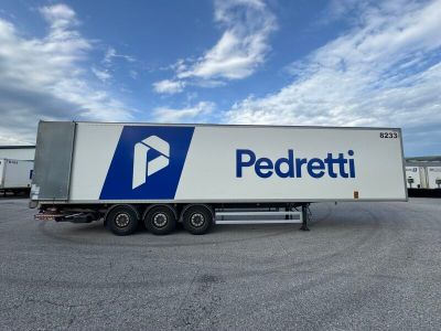 a semi truck that is parked in a parking lot
