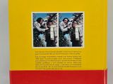 a yellow and red book with two pictures of a man and a woman