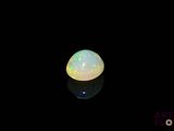 an oplite is shown in the dark with a reflection on the ground
