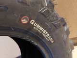 a tire with spikes on the rim of it