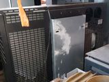 a dirty kitchen with a dirty stove and a dirty oven