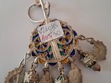 a keychain with a bunch of charms hanging from it