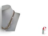 gold plated chain necklace on a mannequin with a white background