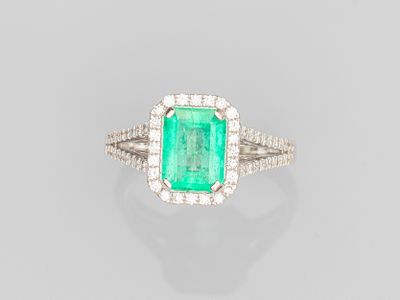 an emerald and diamond ring