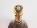 a bottle of wine that is sitting on a table