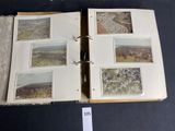 an open book with pictures on it sitting on a table