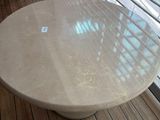 two tables on the deck of a ship with a view of the ocean