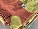 a close up of a pair of pants with buttons on them