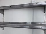 a metal shelf that has two shelves on it