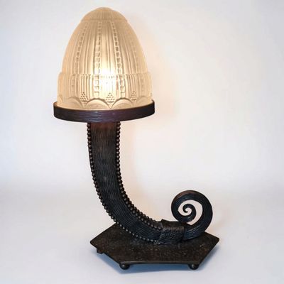 a lamp that is sitting on top of a table